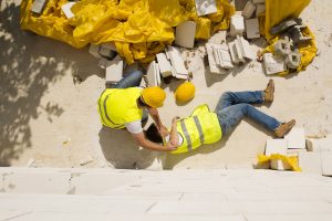 An image featuring workplace accidents, a fallen construction worker