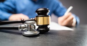 image of medical malpractice featuring a gavel and stethoscope